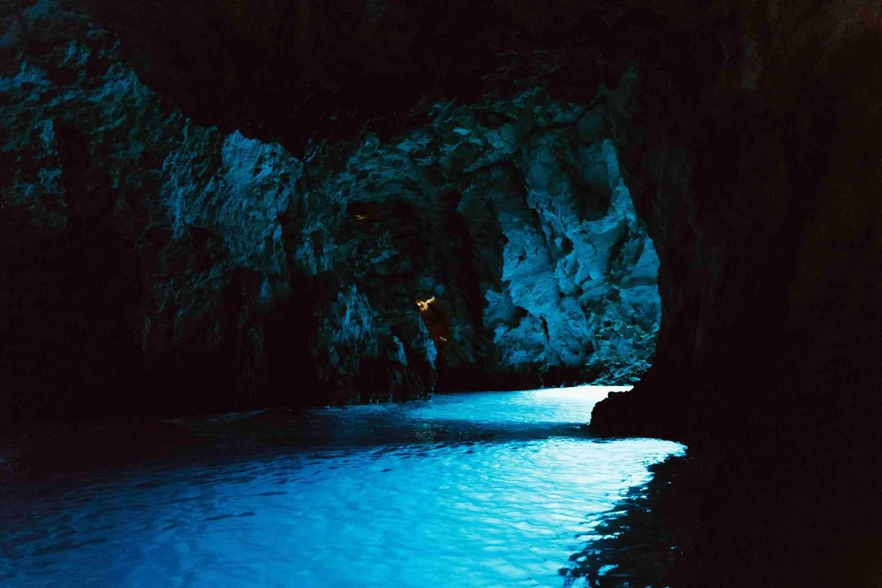 Group speedboat tour entering Blue Cave on Bisevo Island Croatia